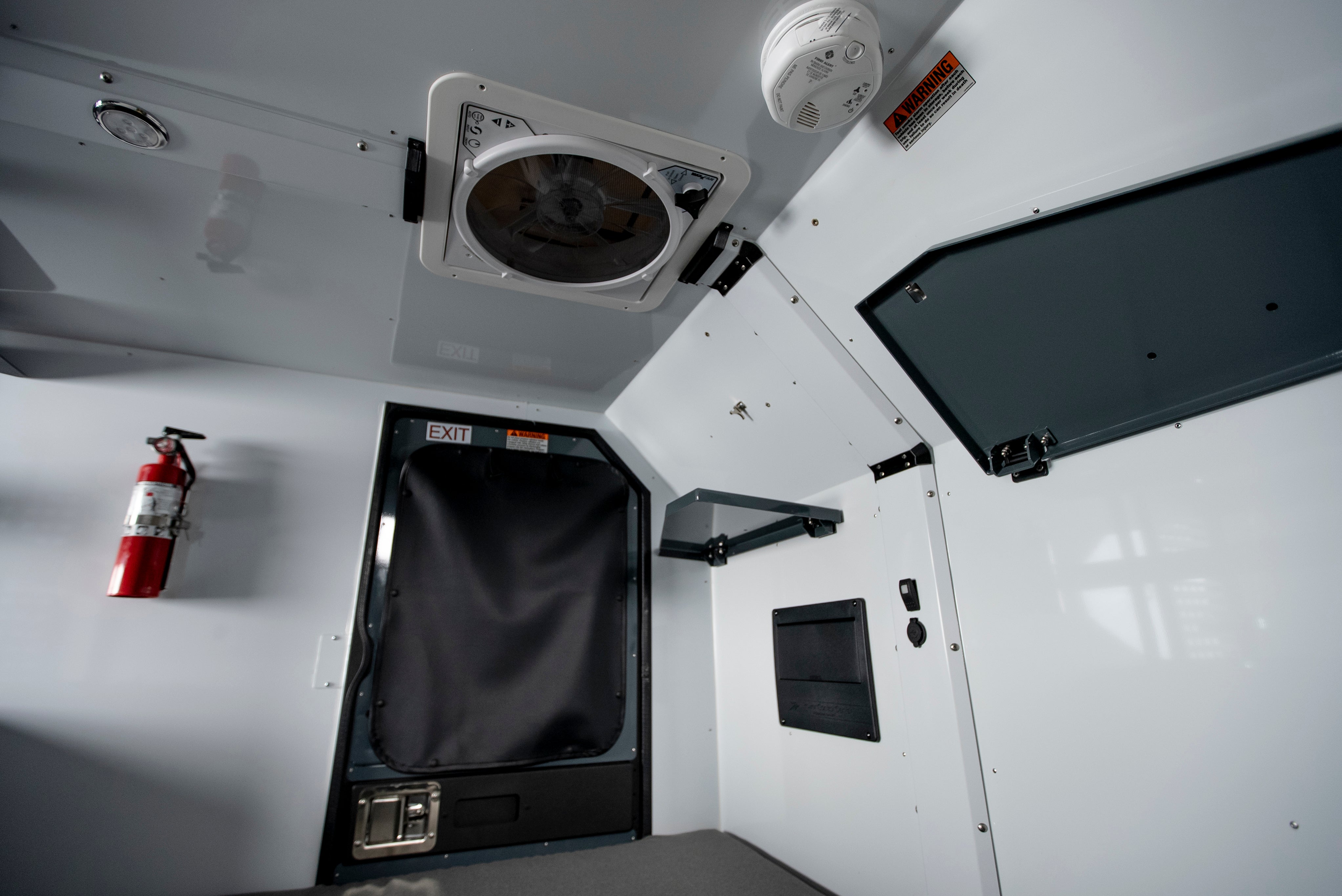 Off Grid Trailers Interior Half Width Drop-Down Shelf